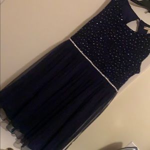 Navy sparkle dresses with belt and rhinestones.